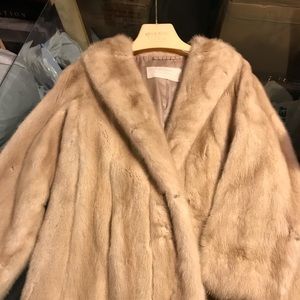 Cream colored fur coat.  (Real Fur)
